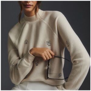 T.La Cream Turtleneck Sweater with Dog Motifs